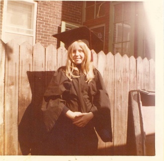 Sharron at 13, pretending she is graduating